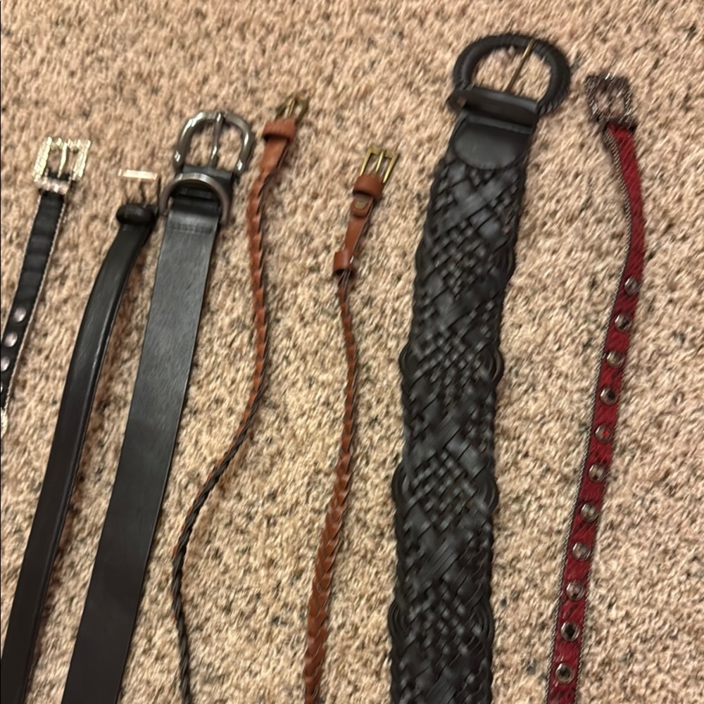 women’s belts. - 12 belts - various colors and designs.